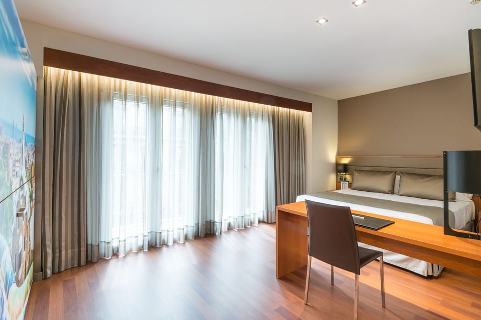 Family Room (Premium 2 adults + 2 children) | Minibar, in-room safe, individually decorated, desk