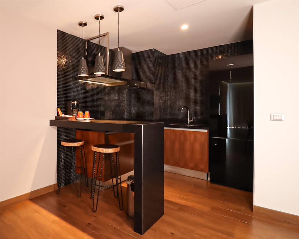 Suite, 1 Bedroom, Partial Ocean View | Private kitchen | Microwave, coffee/tea maker