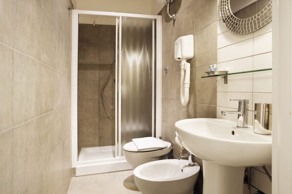 Standard Double Room | Bathroom | Shower, designer toiletries, hair dryer, towels