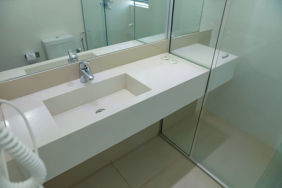Family Triple Room | Bathroom | Shower, free toiletries, hair dryer, towels
