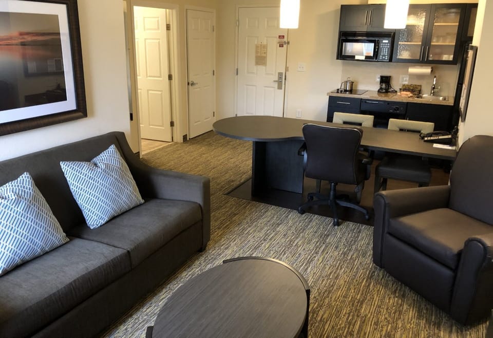 Suite, 1 Bedroom (1 Queen Bed) | Pillowtop beds, in-room safe, desk, iron/ironing board