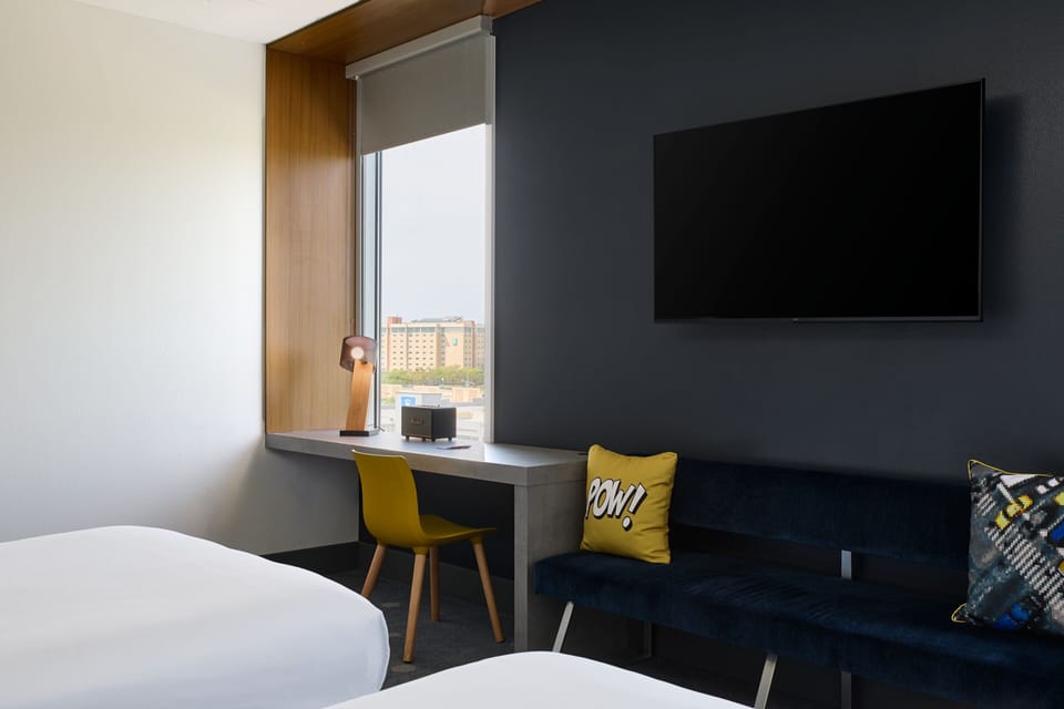 Premium bedding, down comforters, in-room safe, desk
