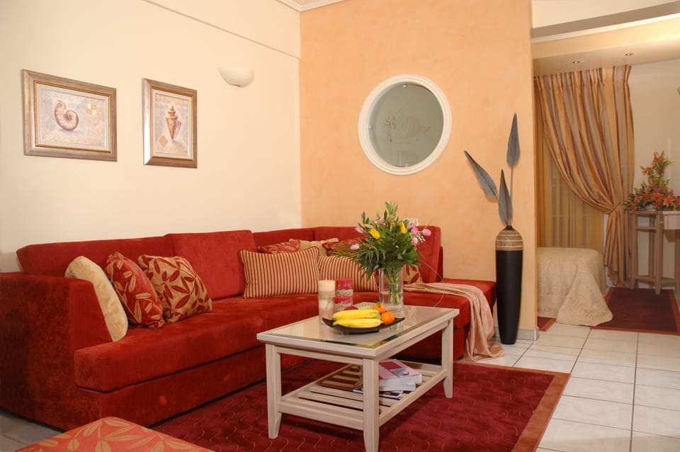 Executive Suite, 2 Bedrooms | Living room | 43-inch LED TV with digital channels, TV