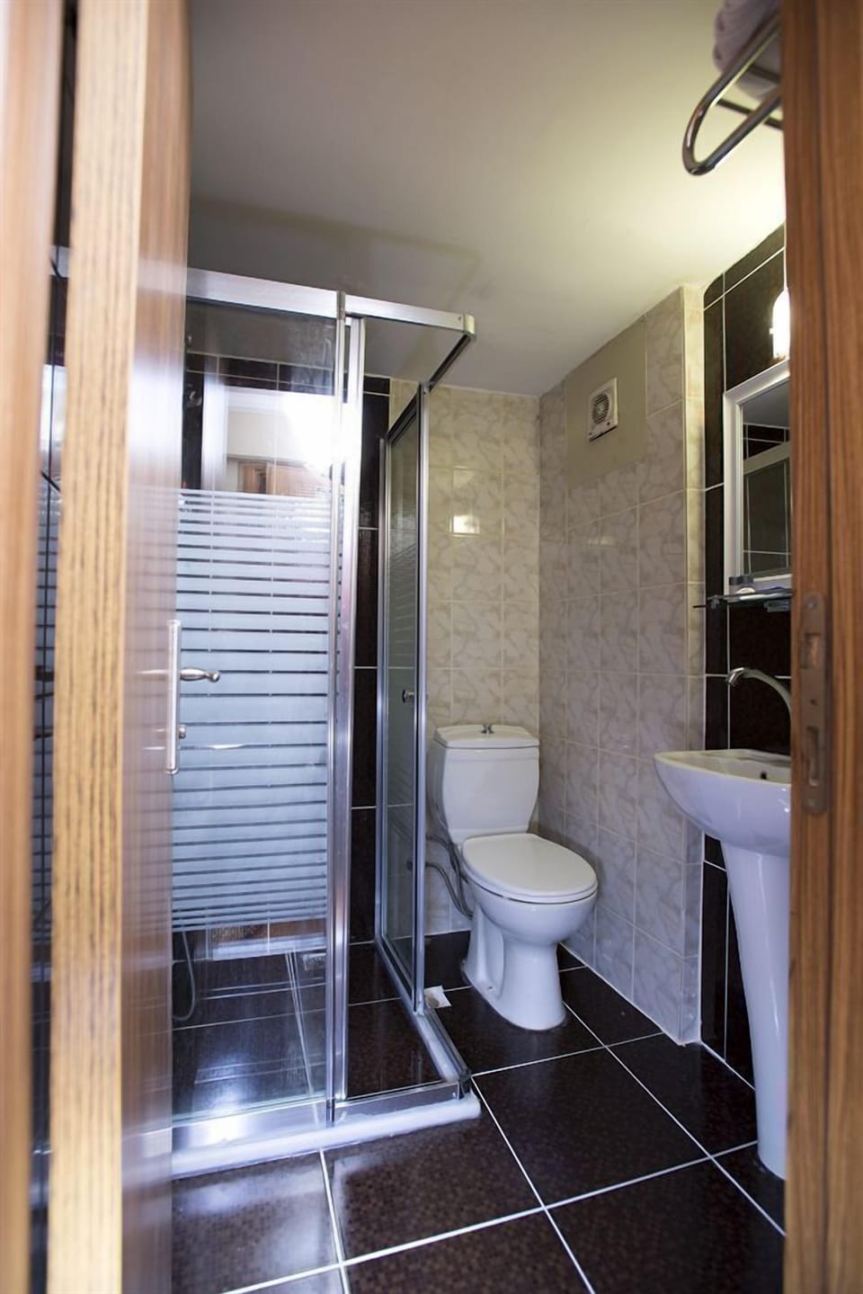 Shower, free toiletries, hair dryer, slippers
