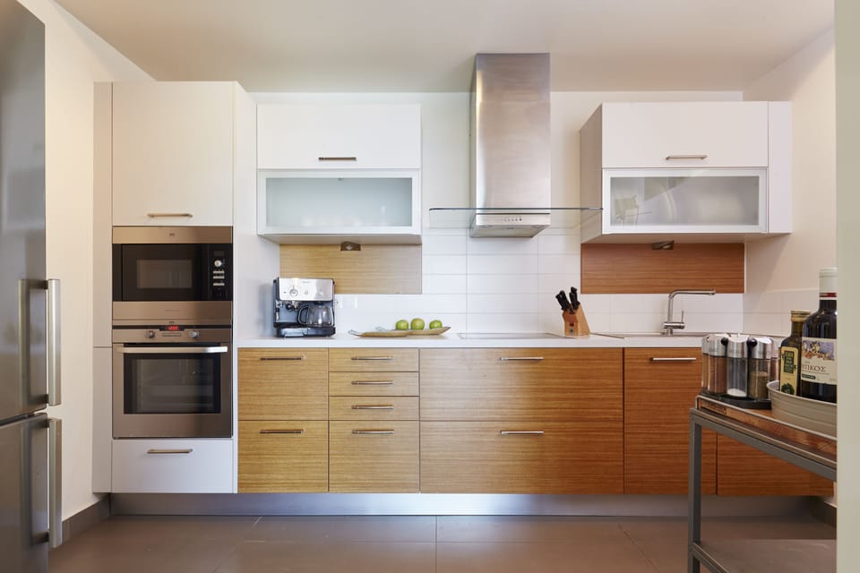 Villa, 4 Bedrooms | Private kitchen | Full-size fridge, microwave, oven, stovetop