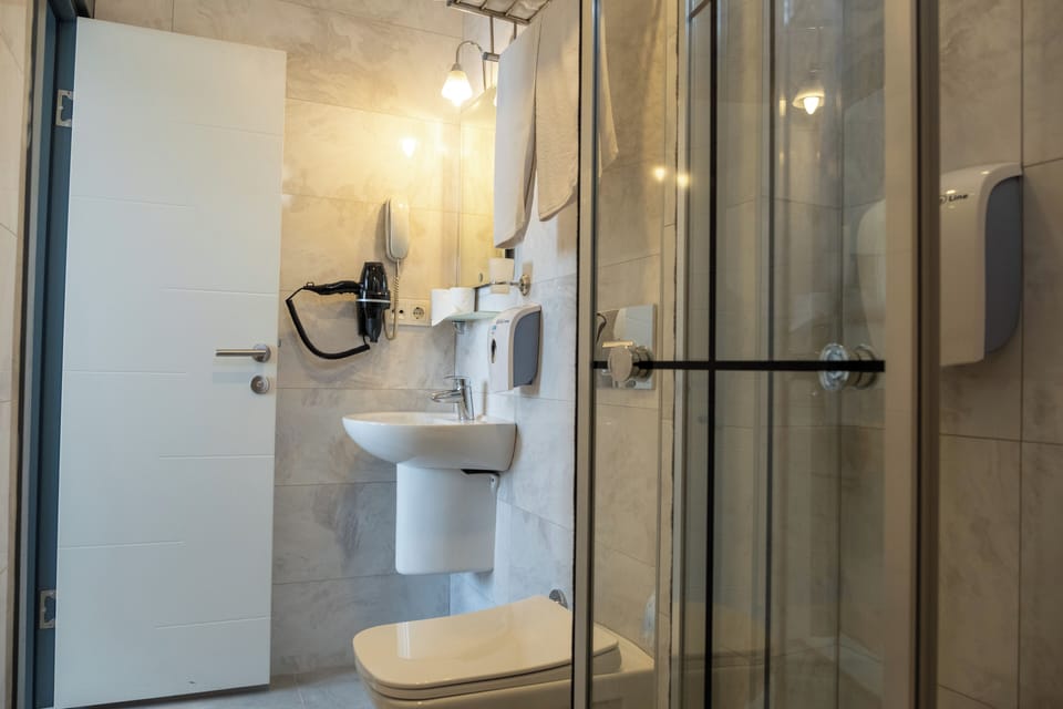 Standard Double or Twin Room, Sea View | In-room safe, desk, soundproofing, iron/ironing board