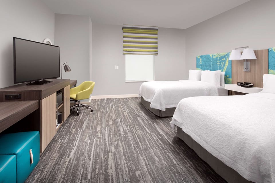 Premium bedding, down comforters, in-room safe, desk