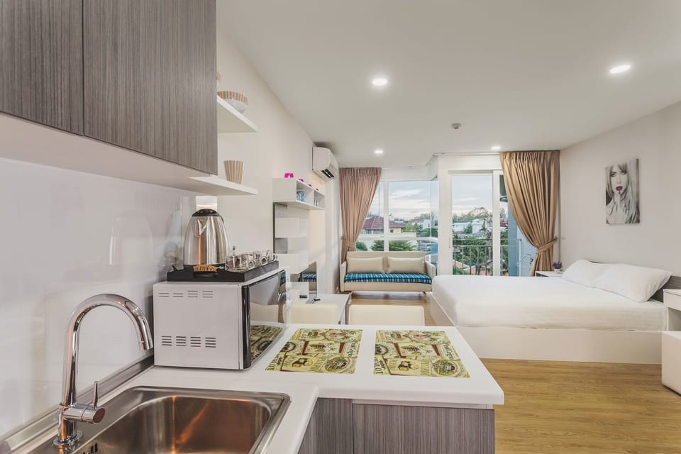 Standard Condo, 1 Bedroom | 1 bedroom, in-room safe, iron/ironing board, free WiFi