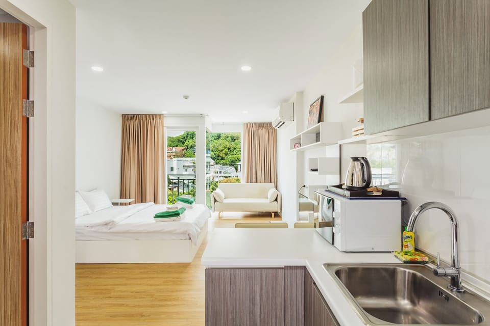 Studio, 1 Bedroom | In-room safe, desk, blackout drapes, iron/ironing board