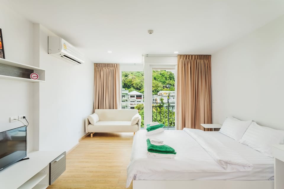 Condo, 1 Bedroom | 1 bedroom, in-room safe, blackout drapes, iron/ironing board