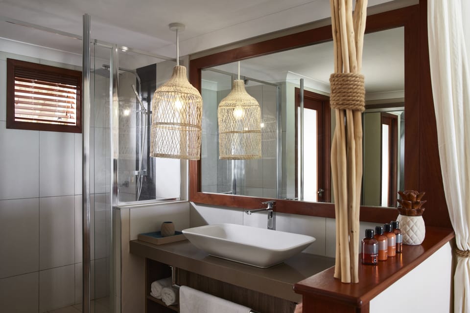 Shower, eco-friendly toiletries, hair dryer, bathrobes