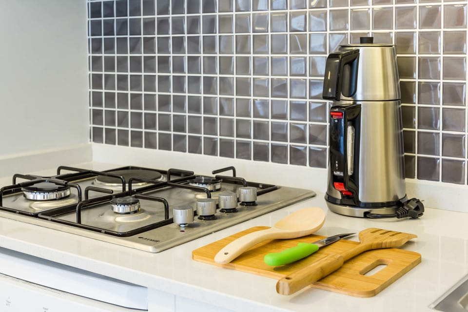 Deluxe Apartment, 1 King Bed with Sofa bed | Private kitchen | Full-size fridge, stovetop, dishwasher, electric kettle