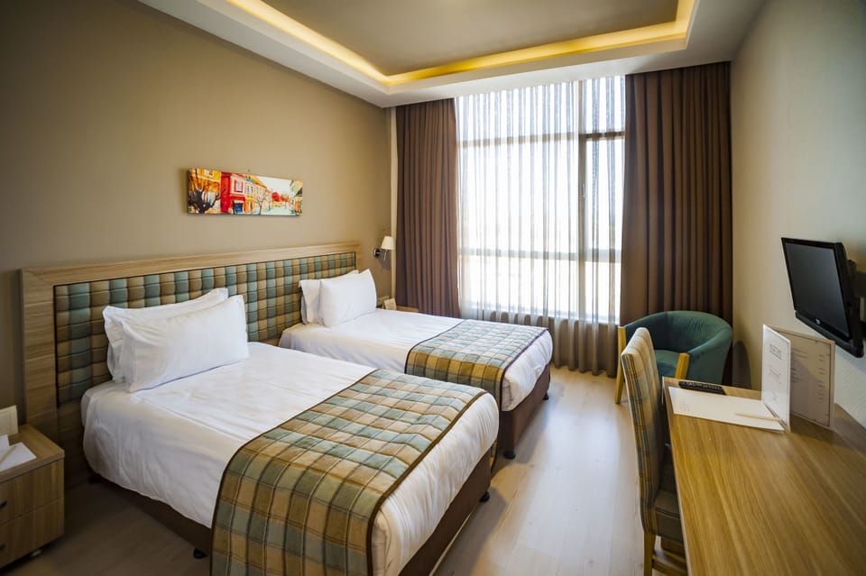 Standard Room | Premium bedding, minibar, in-room safe, desk