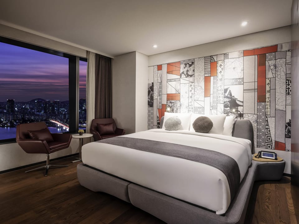 Premium bedding, down comforters, in-room safe, desk