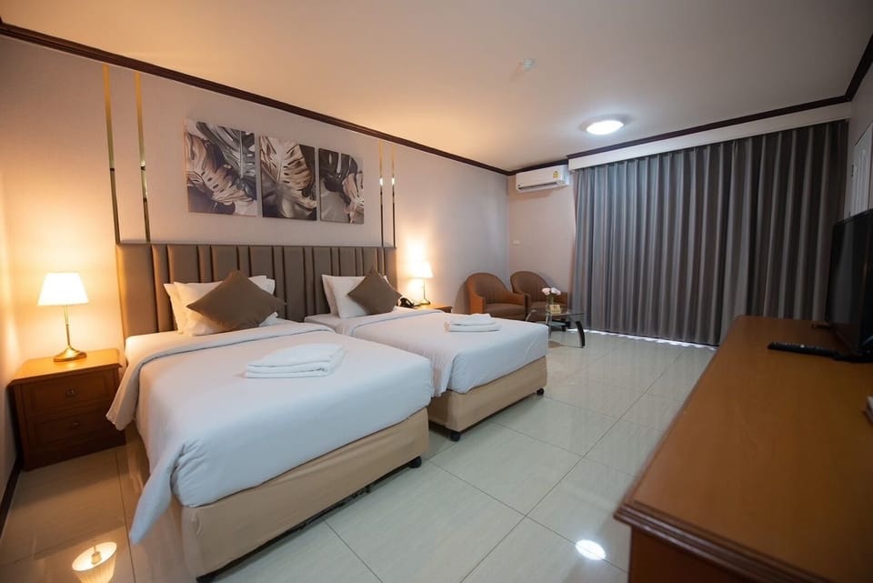 Superior Room | Minibar, in-room safe, desk, laptop workspace