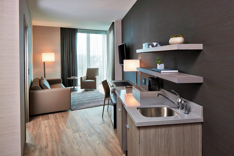 Suite, Multiple Beds, Roll-in Shower, River View | Premium bedding, pillowtop beds, desk, laptop workspace