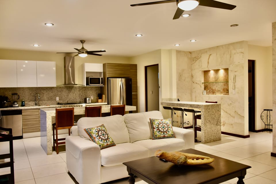 Family Apartment | Living area | 24-inch flat-screen TV with cable channels, TV