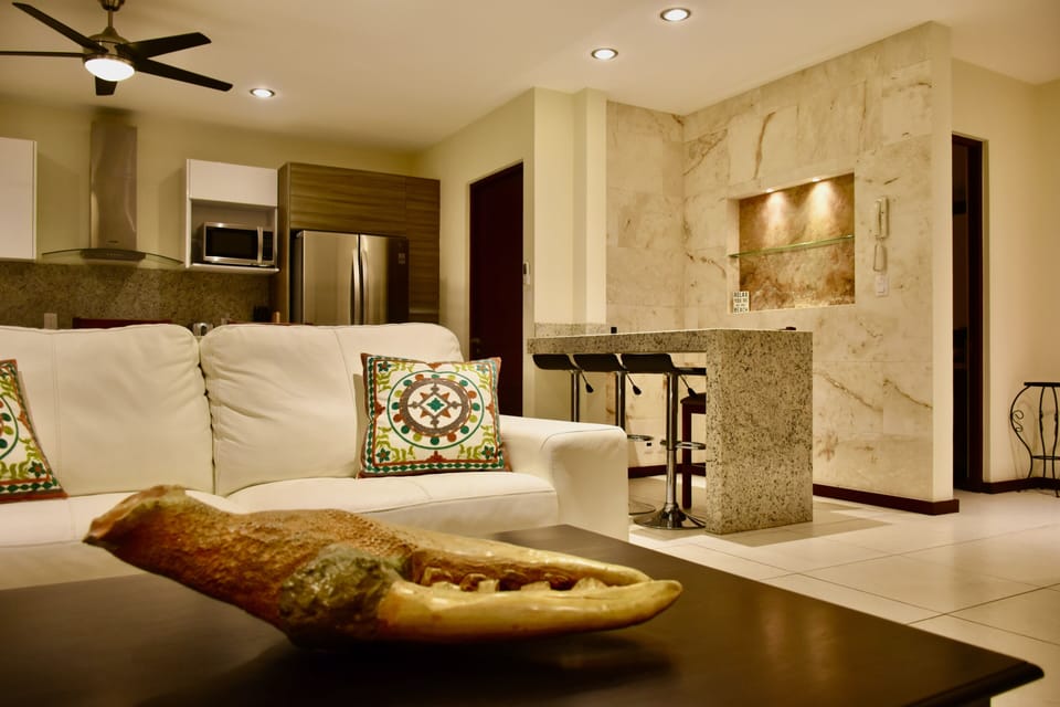 Family Apartment | Living area | 24-inch flat-screen TV with cable channels, TV
