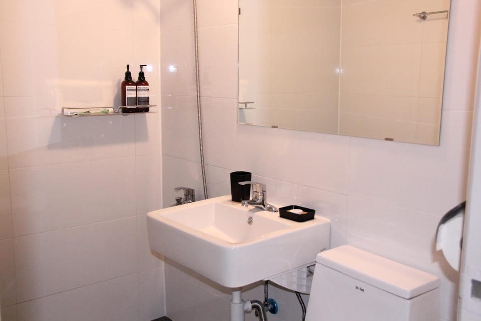 Shower, free toiletries, hair dryer, slippers