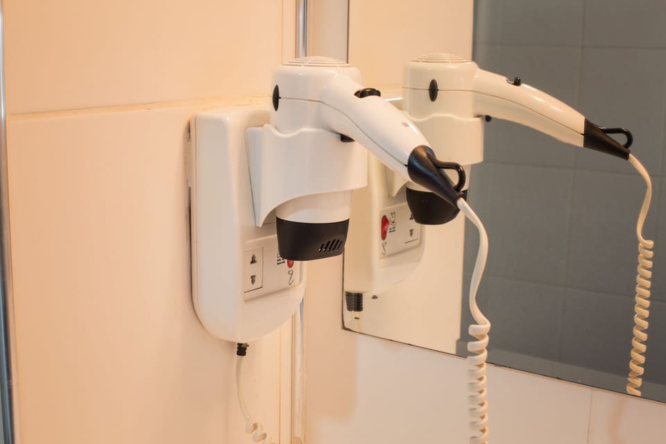 Shower, rainfall showerhead, designer toiletries, hair dryer