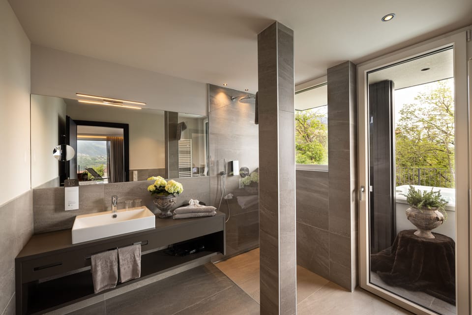 Double Room, Valley View | Bathroom | Shower, hair dryer, bathrobes, towels
