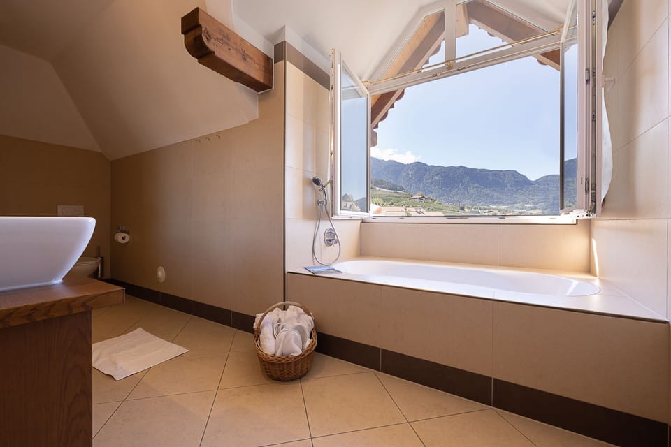 Panoramic Suite, Valley View | Bathroom | Shower, hair dryer, bathrobes, slippers
