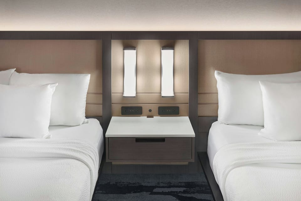 Premium bedding, desk, blackout drapes, iron/ironing board