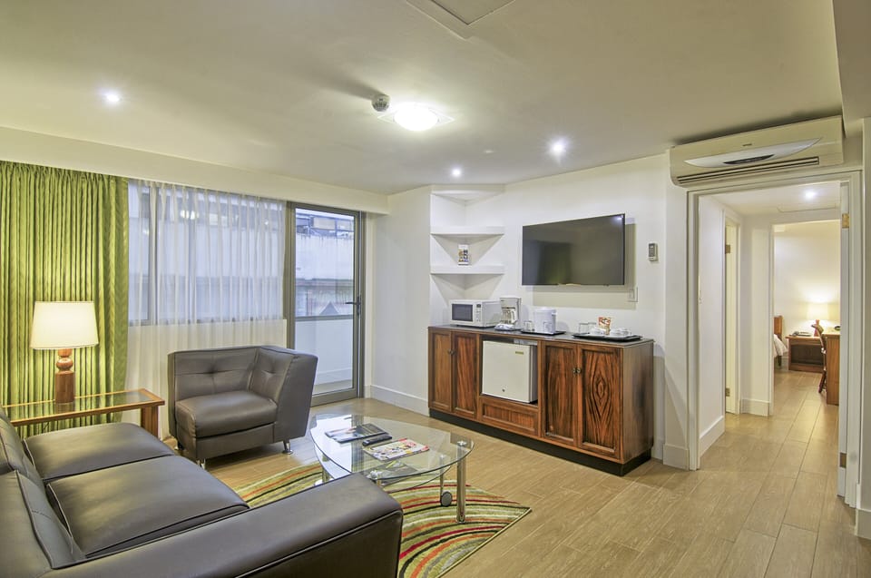 Family Suite | Living room | Flat-screen TV