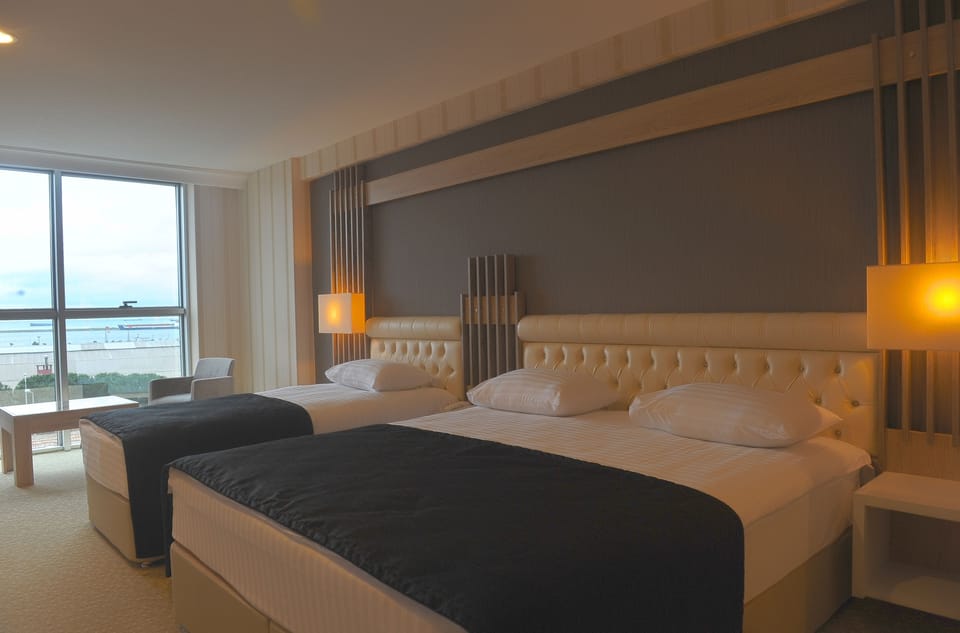 Standard Triple Room | Premium bedding, minibar, in-room safe, desk