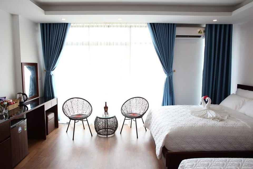 Deluxe Quadruple Room | Premium bedding, down comforters, memory foam beds, minibar
