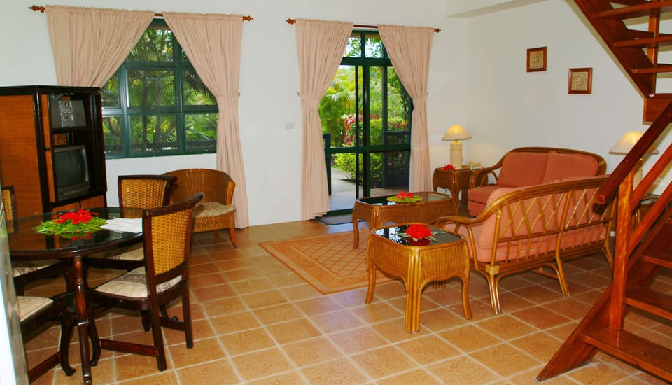 Apartment, 2 Bedrooms | Living area | 32-inch flat-screen TV with satellite channels, TV, first-run movies