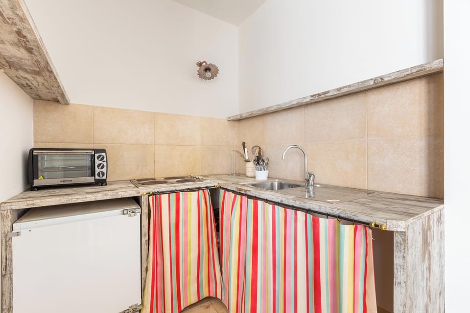 Family Apartment, 1 Bedroom | In-room dining