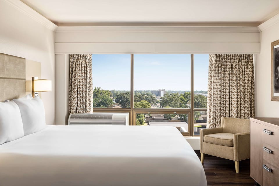 Suite, 1 King Bed, Non Smoking | Premium bedding, in-room safe, desk, laptop workspace