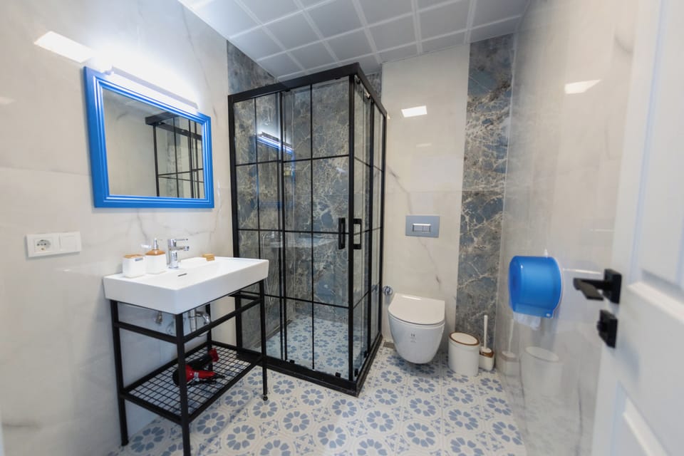 Standard Suite, 1 Bedroom | Bathroom | Shower, free toiletries, hair dryer, slippers