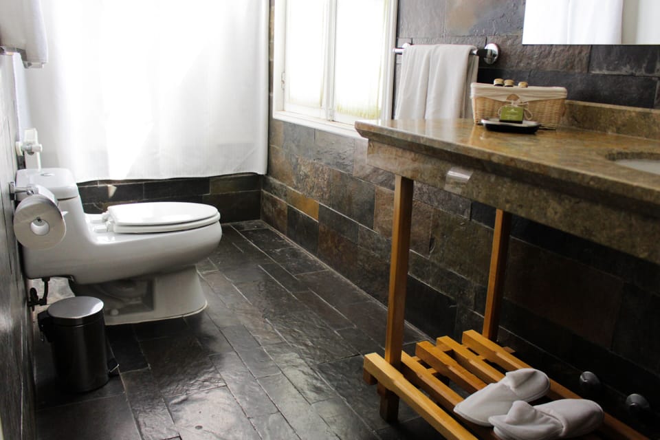 Double Room (Colours) | Bathroom | Combined shower/tub, deep soaking tub, designer toiletries, hair dryer