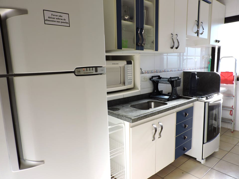 Family Apartment | Private kitchen | Fridge, microwave, oven, stovetop