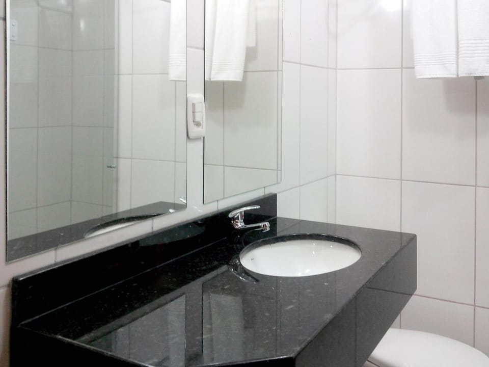 Deluxe Triple Room | Bathroom | Shower, rainfall showerhead, designer toiletries, hair dryer