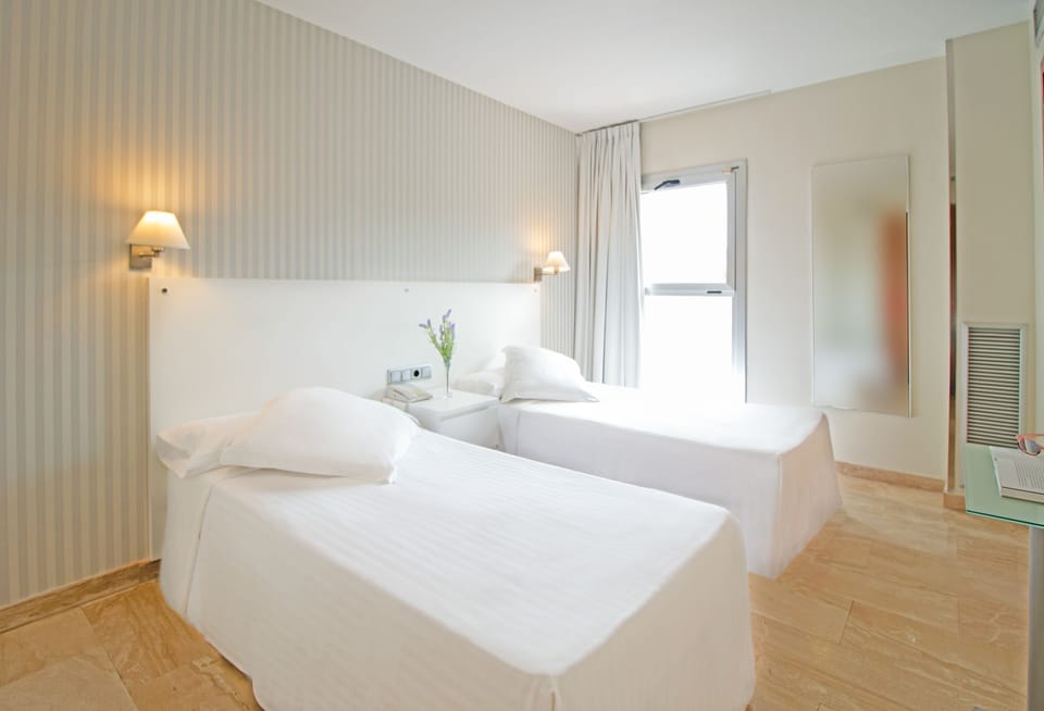 Premium bedding, minibar, in-room safe, blackout drapes