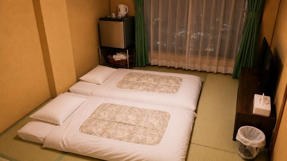 Economy Room, Non Smoking | In-room safe, blackout drapes, WiFi (free), bed sheets