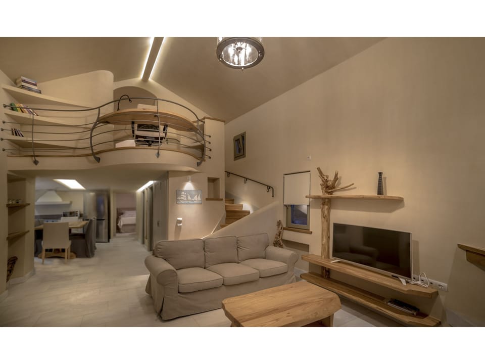Luxury Villa, 3 Bedrooms, 2 Bathrooms, Beachfront | Living room | Flat-screen TV, fireplace
