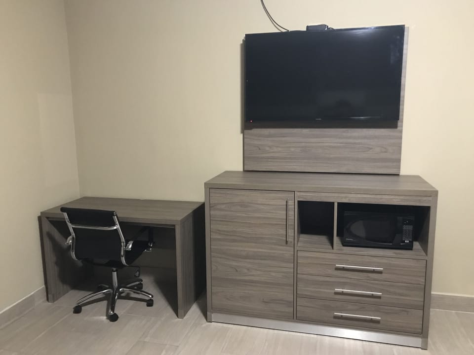 Desk, laptop workspace, iron/ironing board (on request), WiFi (free)