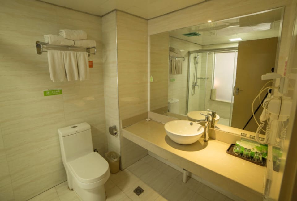 Shower, free toiletries, hair dryer, slippers