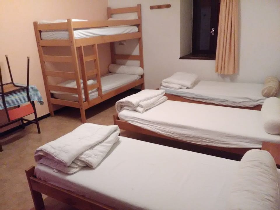 Basic Room, Multiple Beds, Ensuite (Shared WC) | Iron/ironing board, bed sheets