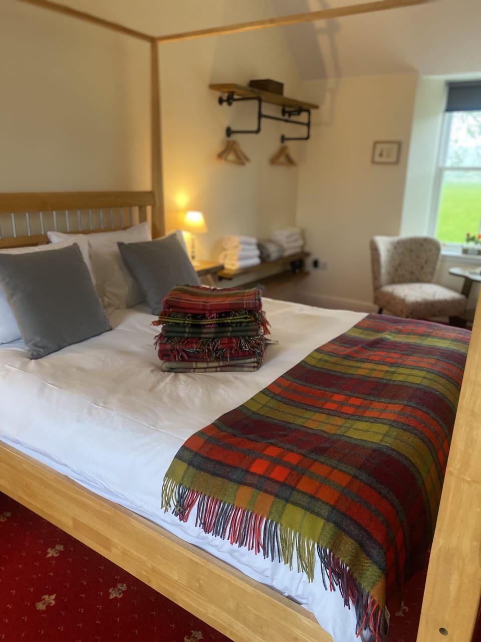 Premium bedding, desk, laptop workspace, blackout drapes