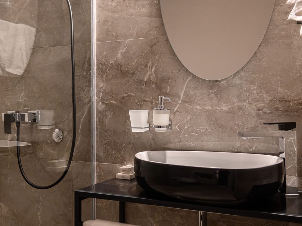 Shower, free toiletries, hair dryer, bathrobes