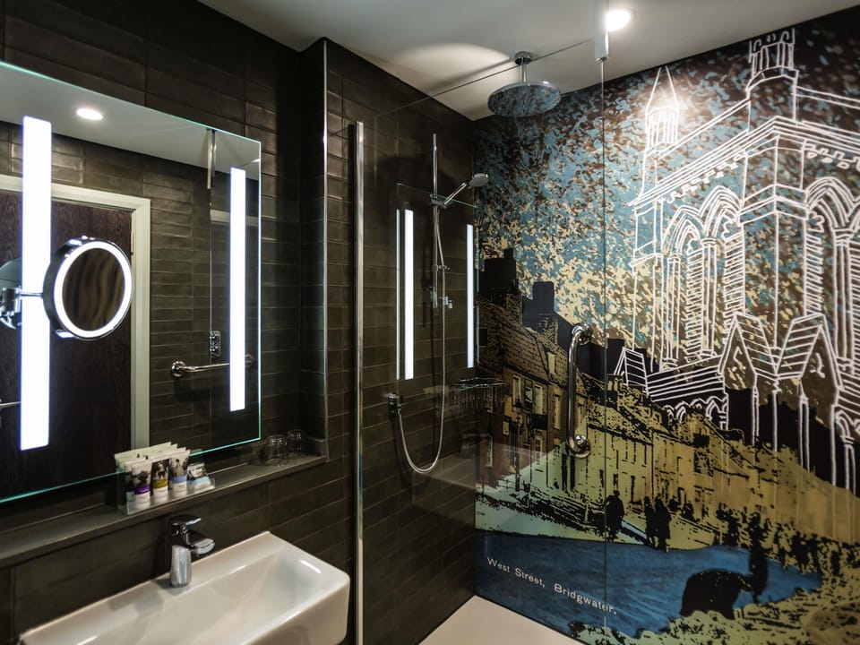 Shower, eco-friendly toiletries, hair dryer, towels