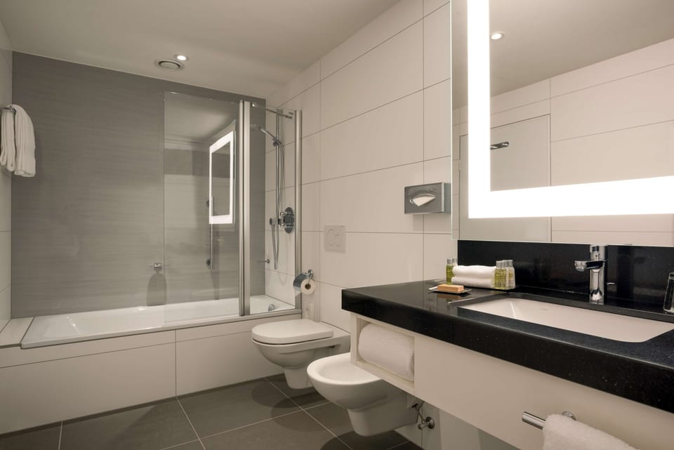 Suite, 1 King Bed, Kitchenette | Bathroom shower