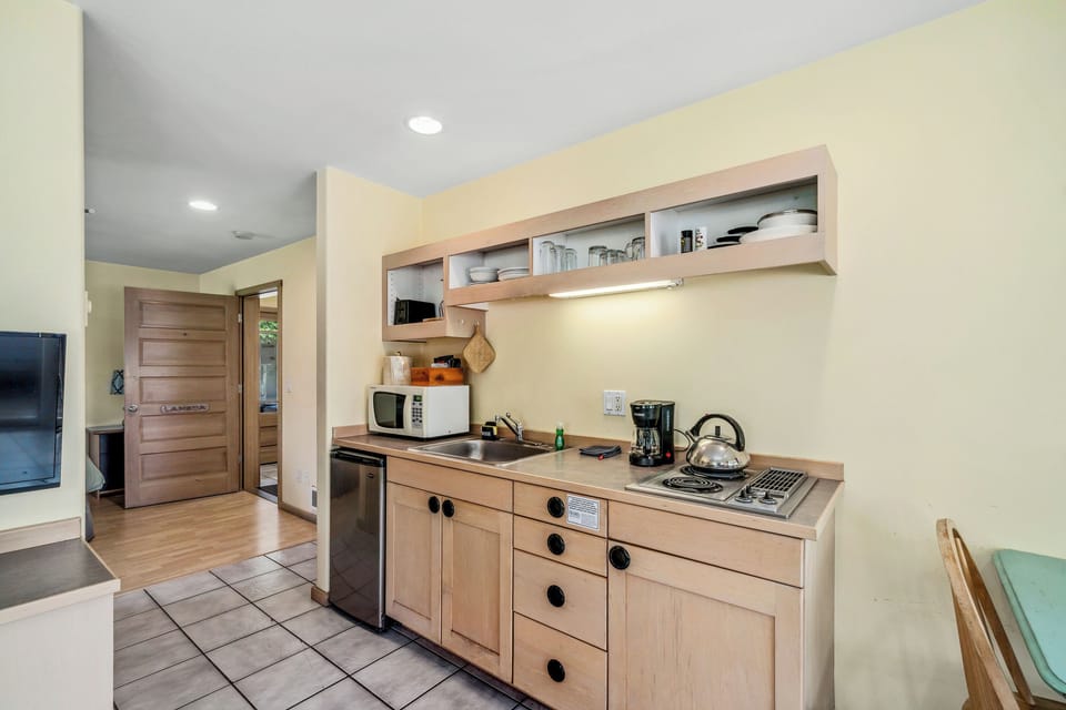 Luxe King Suite | Private kitchen | Microwave, electric kettle