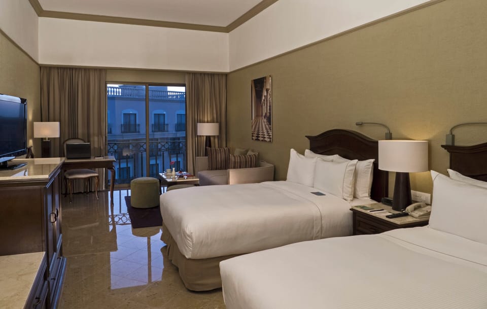 Down comforters, pillowtop beds, minibar, in-room safe