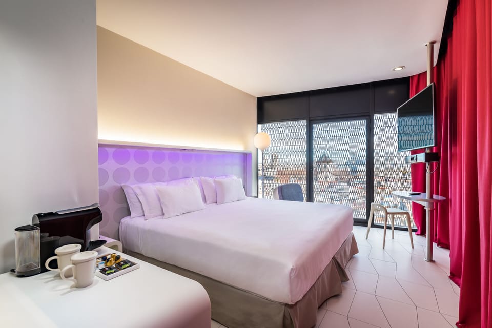 Deluxe Room, City View | Premium bedding, minibar, in-room safe, desk